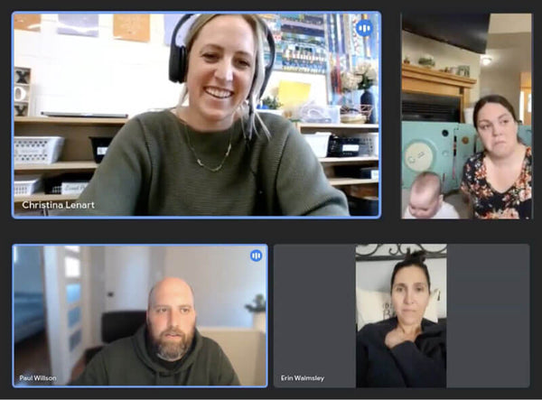 Four people on a video call in a grid layout.