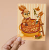 Greeting card with a mom and baby bunny and a pot labeled 'Mom, you're souper'.