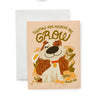 Greeting card with an illustrated dog surrounded by flowers and the letters "Thanks for Helping Me Grow".