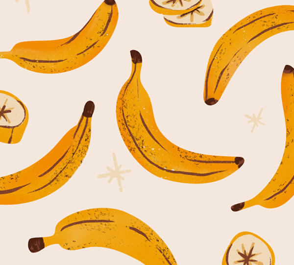 Pattern of bananas on a beige background