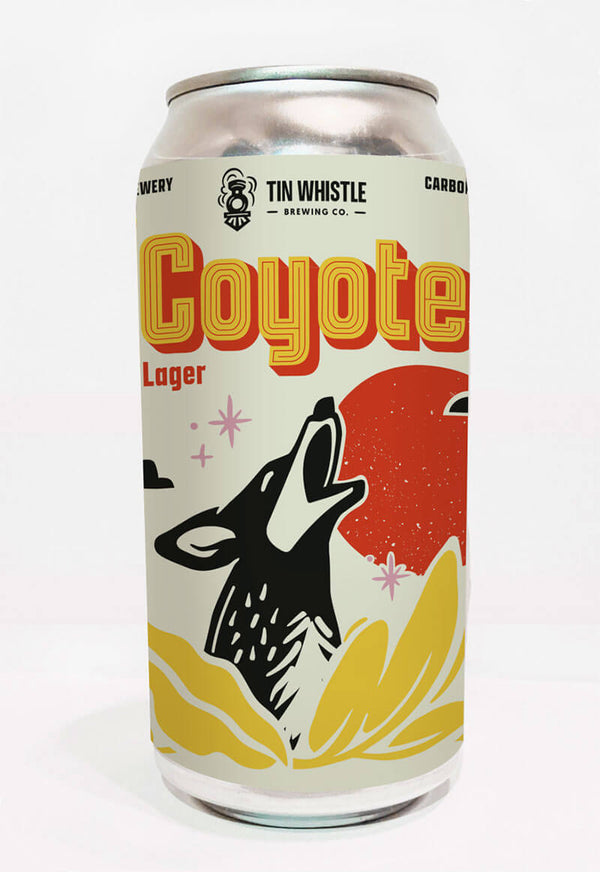 Coyote Lager can with Tin Whistle Brewing Co. branding on a white background